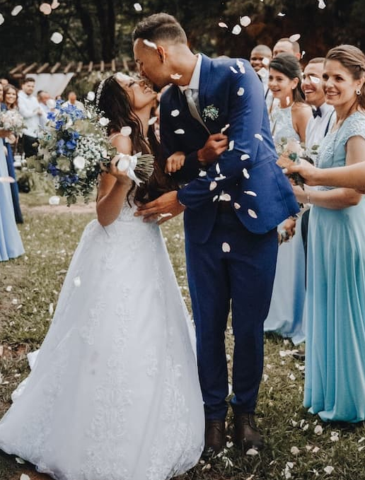 wedding couple sharing a kiss